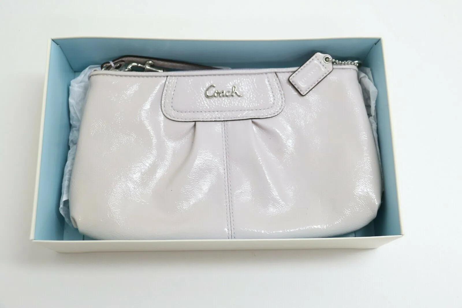 Coach: Medium Leather Satted / Glossy - Clutch